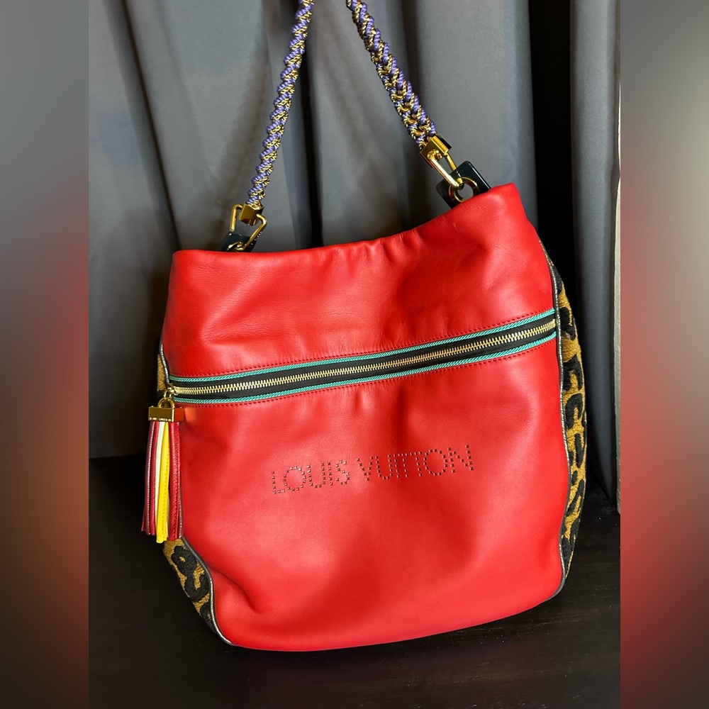 LV Flight Safari Bag Limited edition. Original. Leather and Python Leather.